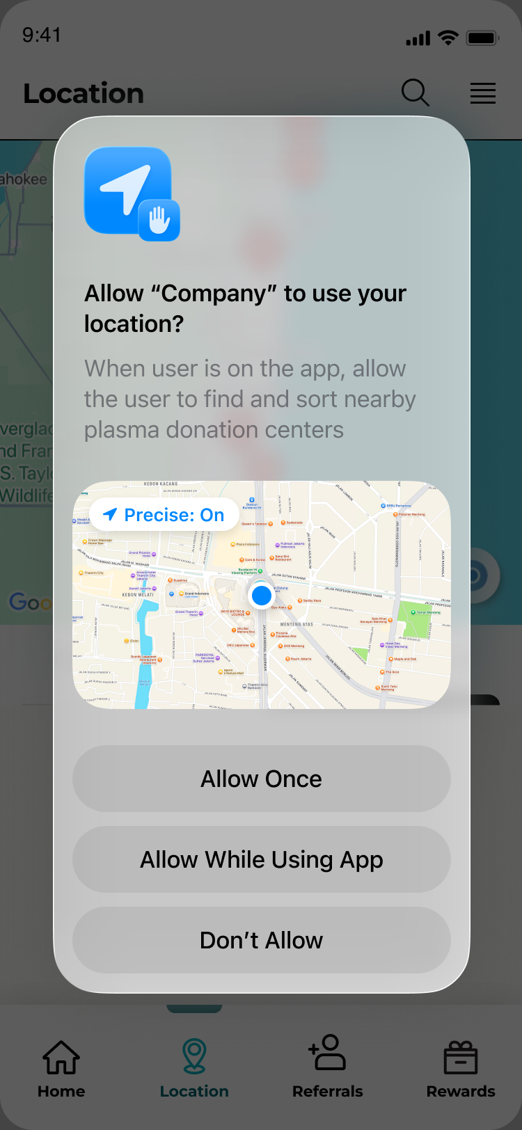 The iOS system dialog asking to allow the app to use your location